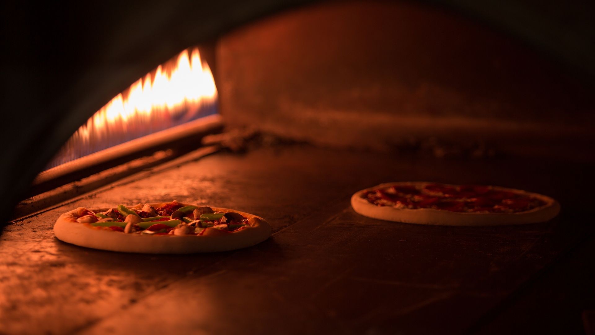 Pizza being cooked in the oven
